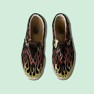 Black flaming slip on vans